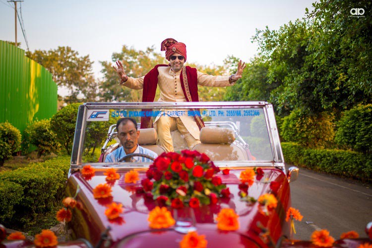 A dancing groom during his barat. by Akash Anand Photography Wedding-photography Groom-wear-and-accessories | Weddings Photos & Ideas