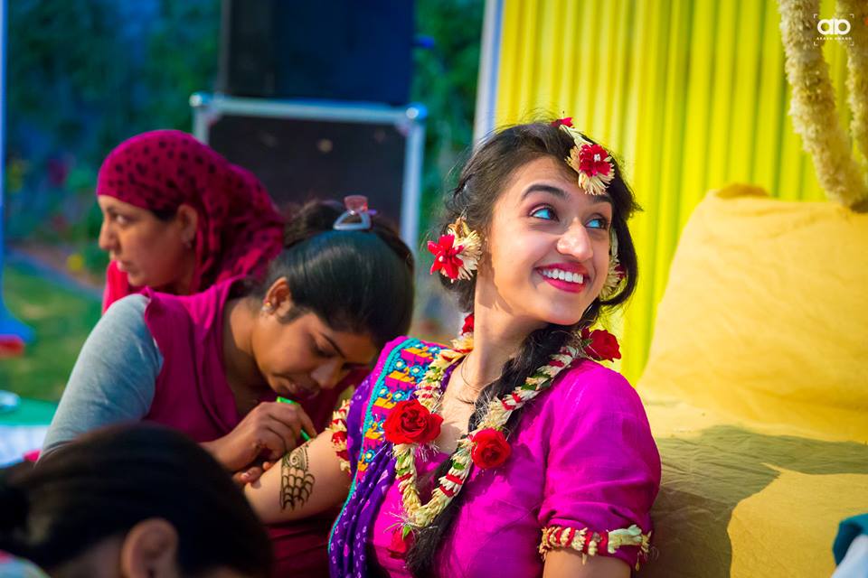 A happy bride on her mehendi function. by Akash Anand Photography Wedding-photography Bridal-makeup | Weddings Photos & Ideas