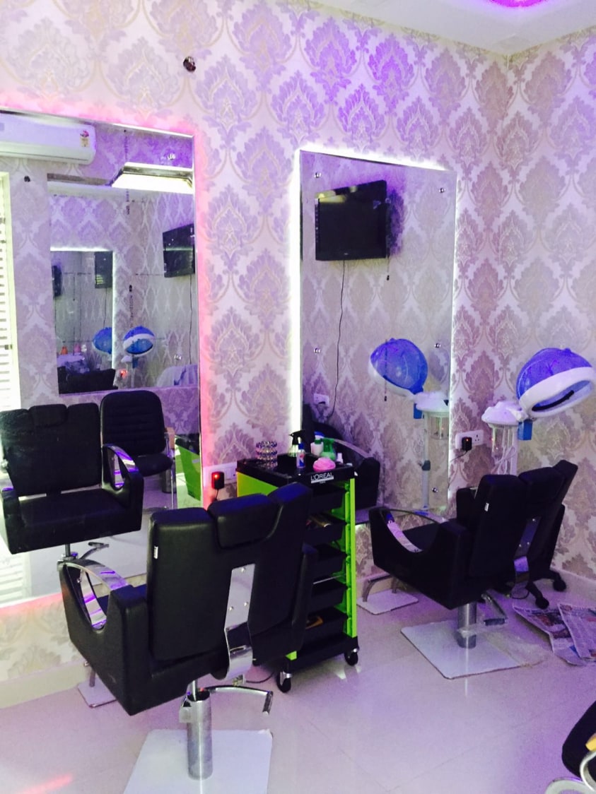 Salon With Black Revolving Chair And Purple Wallpaper by Arpit Khurana Contemporary | Interior Design Photos & Ideas