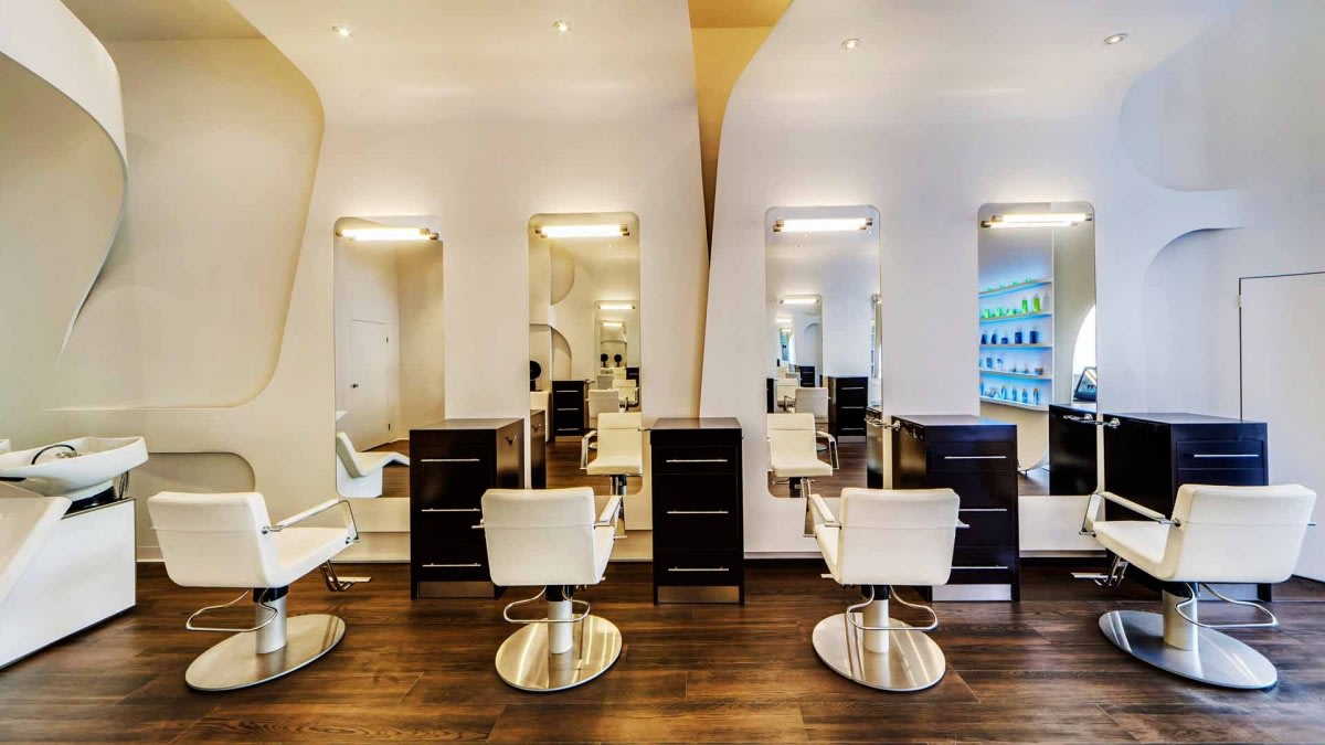 Wooden Flooring And White Round Chairs In Salon by Hemant Sahni Modern | Interior Design Photos & Ideas