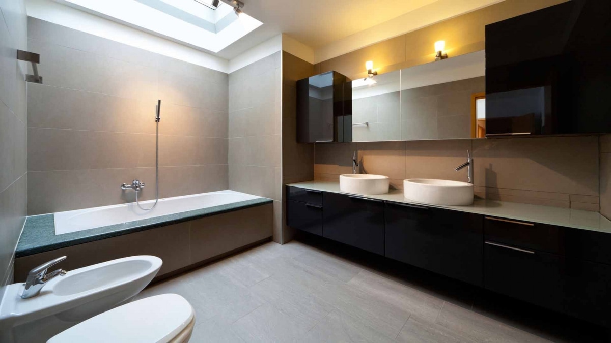 Wooden Cabinets And Built In Bathtub In Western Bathroom by Hemant Sahni Bathroom Modern | Interior Design Photos & Ideas
