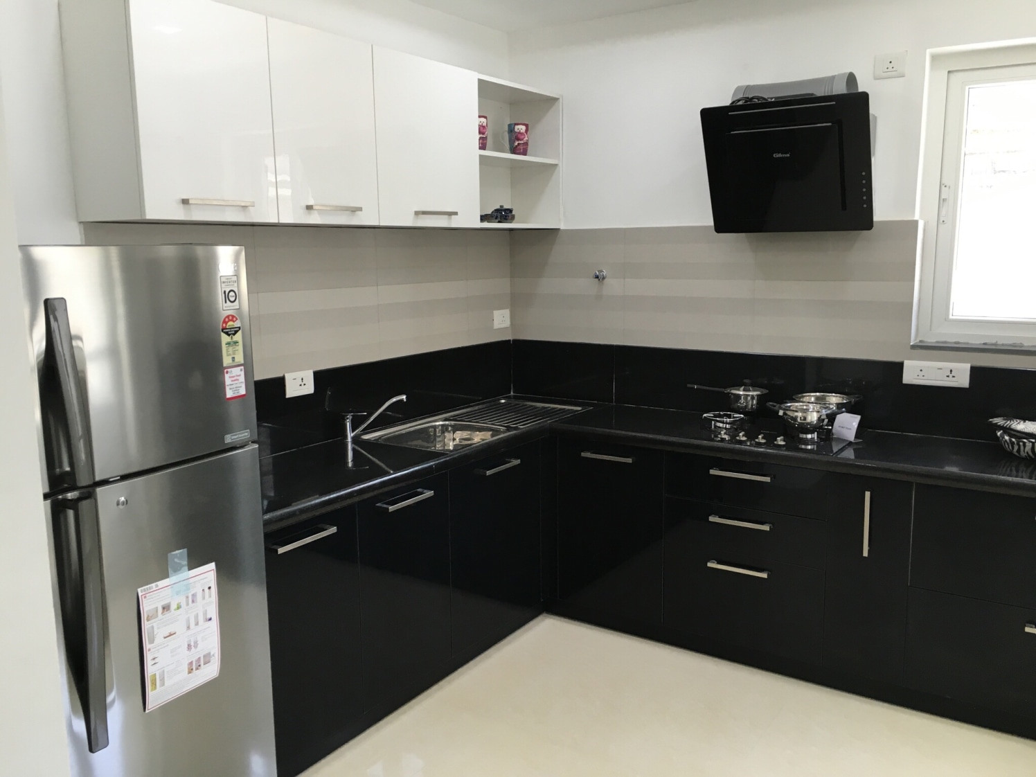 Black Modular Kitchen by Prabhakar