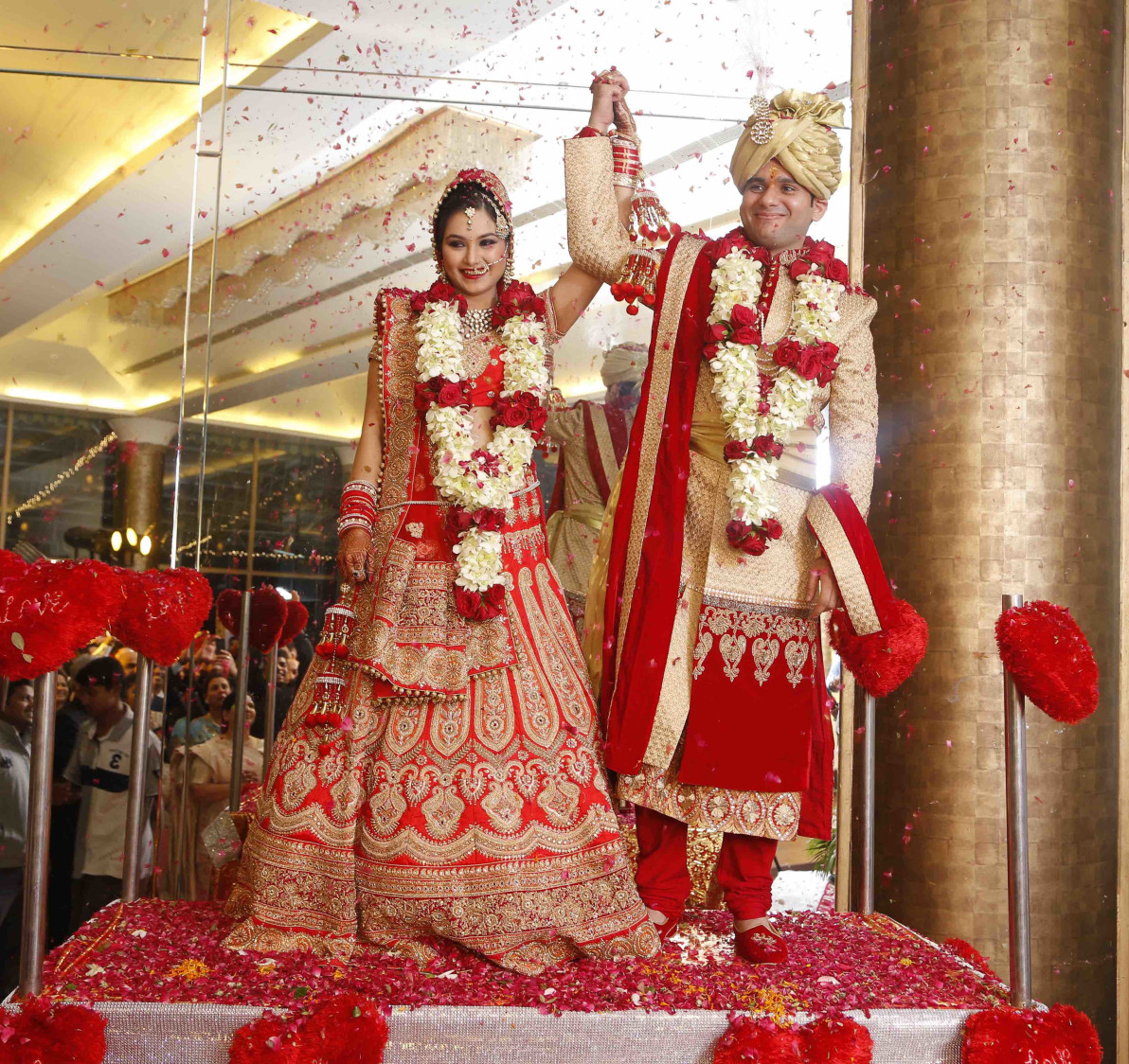 Crimson Red Bridal Lehenga with Golden Motifs And Stunning Golden Scarlet Red Groom Sherwani by Ravneet Oberoi Wedding-photography Groom-wear-and-accessories Wedding-dresses | Weddings Photos & Ideas