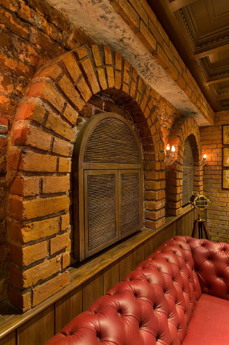 Brick Wall In the Cafe by Namah Design Studio | Interior Design Photos & Ideas