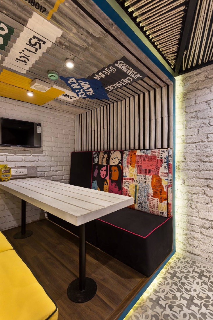 Pop of Color in the Cafe by Namah Design Studio | Interior Design Photos & Ideas