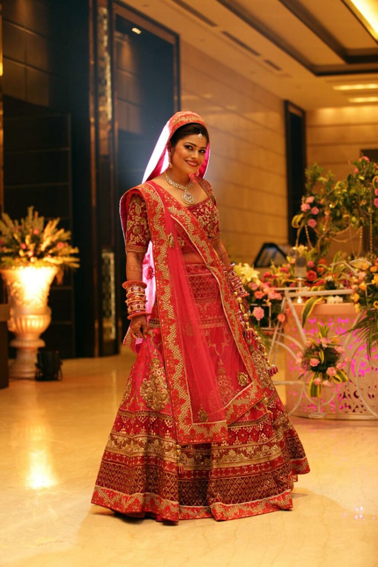 Splendid Bride Wearing Red Lehenga With Golden Embroidery by Preeti Sharma Wedding-photography Wedding-dresses | Weddings Photos & Ideas