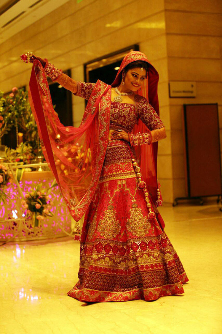 Splendid Bride Wearing Red Lehenga With Golden Embroidery by Preeti Sharma Wedding-photography Wedding-dresses | Weddings Photos & Ideas