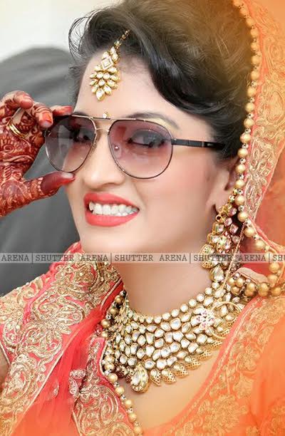 Half smile by SHUTTER ARENA Wedding-photography Bridal-makeup Bridal-jewellery-and-accessories | Weddings Photos & Ideas