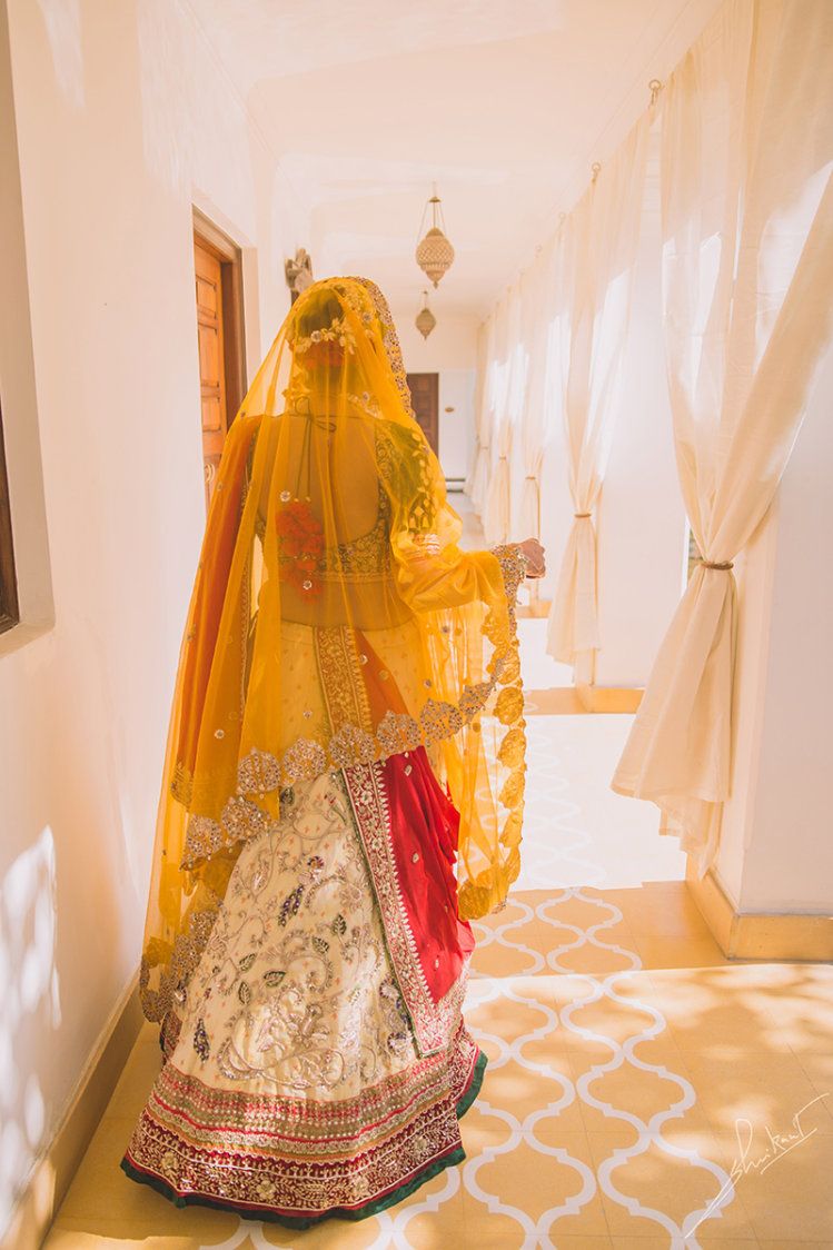 Back shot in amber attire by Shrikant Narayan Arora Wedding-photography | Weddings Photos & Ideas
