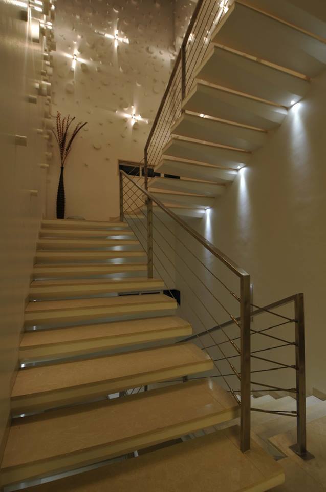 L Shaped Staircase With Cream Shade by Jyoti Yadav Indoor-spaces Modern | Interior Design Photos & Ideas