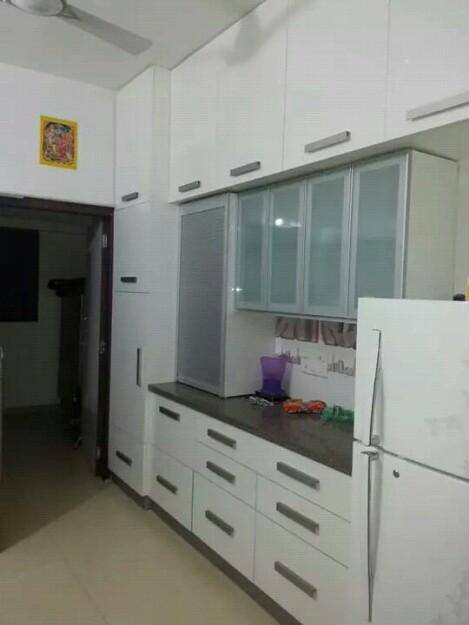 Parallel kitchen with white cabinets by Urban Geometry Modular-kitchen Contemporary | Interior Design Photos & Ideas