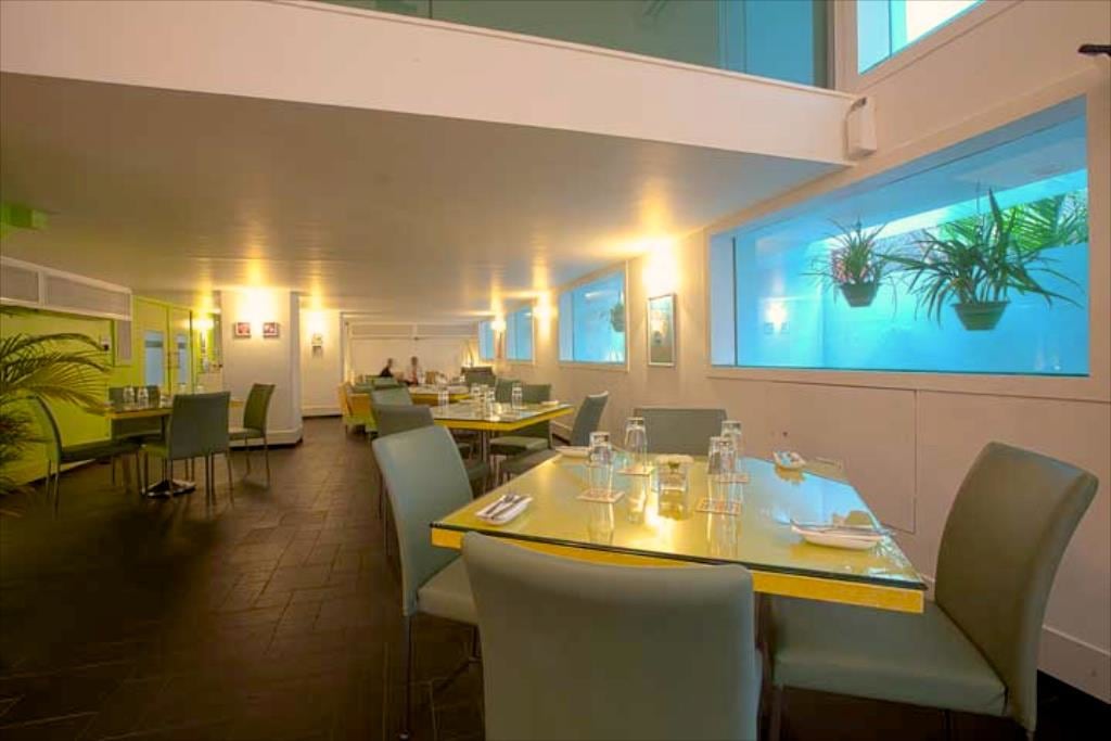 Trendy White Themed Restaurant Decor by Viraf Laskari Modern | Interior Design Photos & Ideas
