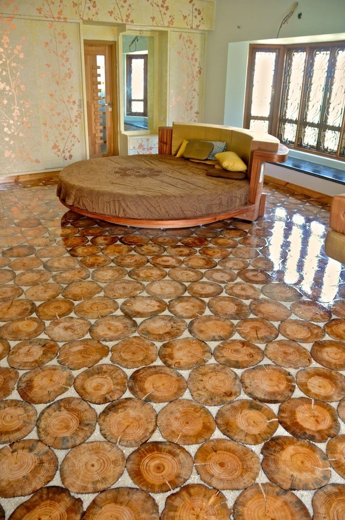 Luxurious Master Bedroom with Round Bed and Patterned Tile Flooring by Viraf Laskari Bedroom Modern | Interior Design Photos & Ideas