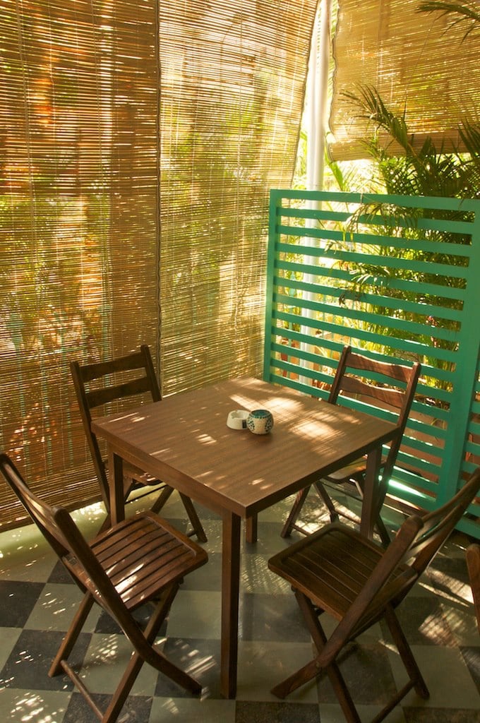 Veranda With Light Brown Shaded Wooden Patio Chairs and Table by Viraf Laskari Modern | Interior Design Photos & Ideas
