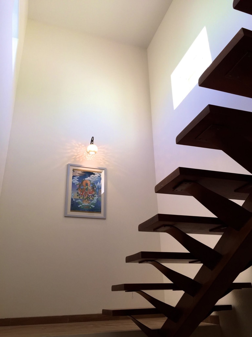 Wood Finished Staircase with Wall art by Viraf Laskari Indoor-spaces Minimalistic | Interior Design Photos & Ideas