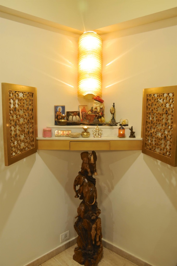 Well Lit Prayer Room with Designed Stand and Yellow Lighting by Viraf Laskari Indoor-spaces Contemporary | Interior Design Photos & Ideas