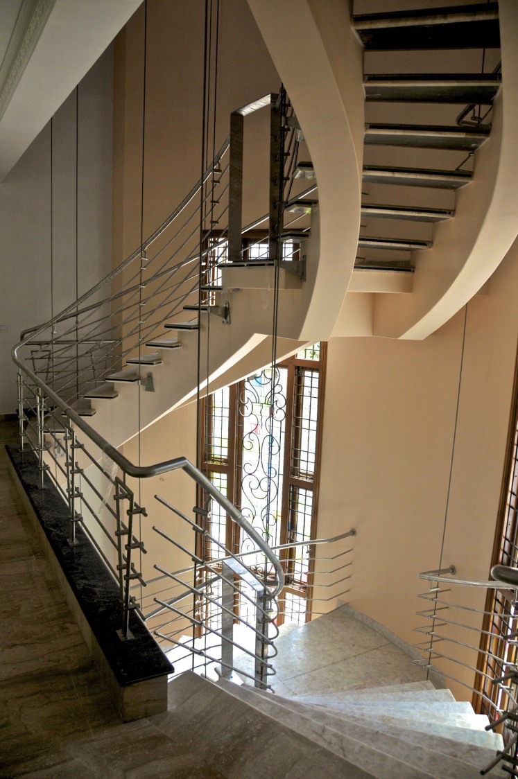 Artistically Designed Marble Staircase by Viraf Laskari Indoor-spaces Contemporary | Interior Design Photos & Ideas