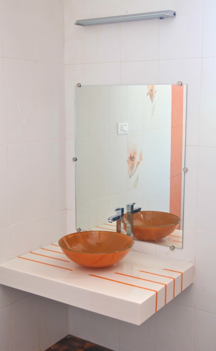 Orange Shaded Sanitary Ware For Bathroom by Viraf Laskari Bathroom Modern | Interior Design Photos & Ideas