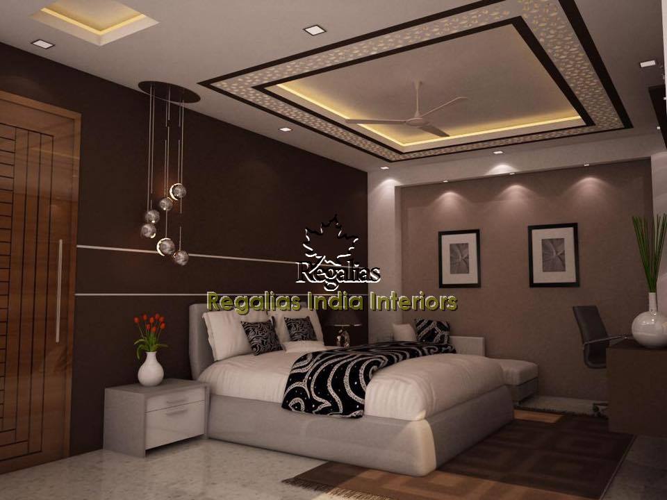Bedroom With Dark Brown Walls And Modern Furniture by Regalias Interiors Bedroom Contemporary | Interior Design Photos & Ideas