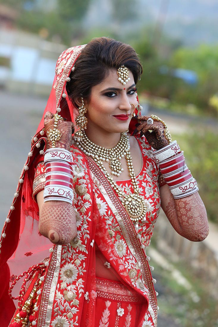 Crimson shades of the bridal outfit with kundan accessories! by Heena Video Wedding-photography | Weddings Photos & Ideas