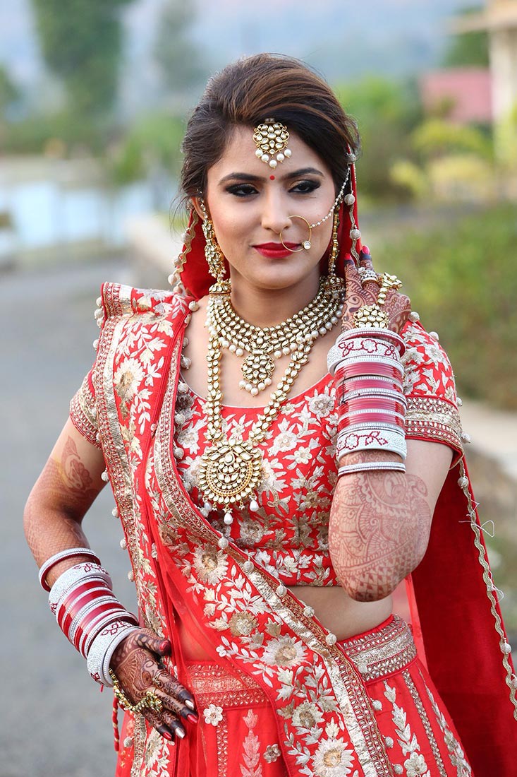 Crimson shades of the bridal outfit with kundan accessories! by Heena Video Wedding-photography | Weddings Photos & Ideas