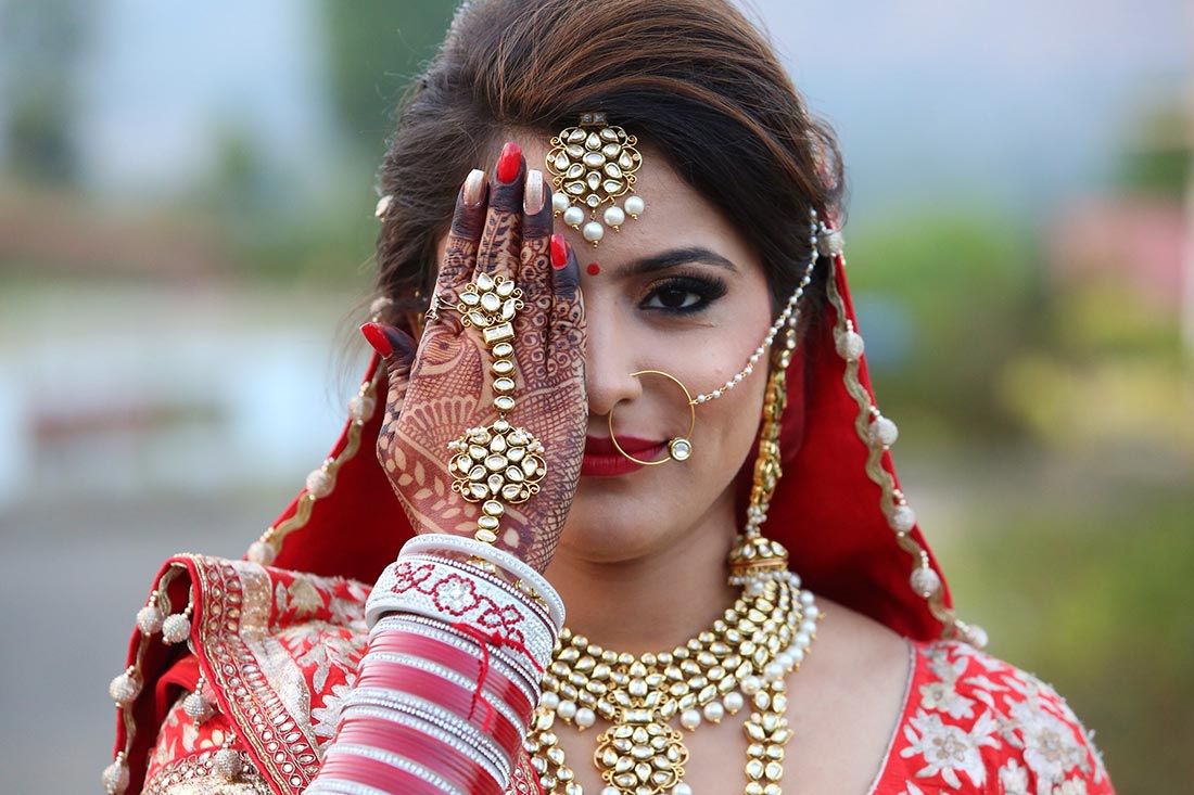 Crimson shades of the bridal outfit with kundan accessories! by Heena Video Wedding-photography | Weddings Photos & Ideas