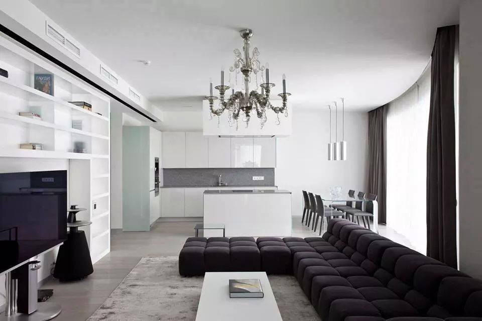 Living Room With Black Sectional Sofa And Crystal Chandelier by HOC Designarch Living-room Modern | Interior Design Photos & Ideas