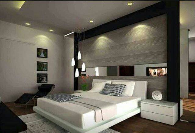 Low Lying Bedroom With Smooth Wooden Wall Surface by HOC Designarch Bedroom Contemporary | Interior Design Photos & Ideas