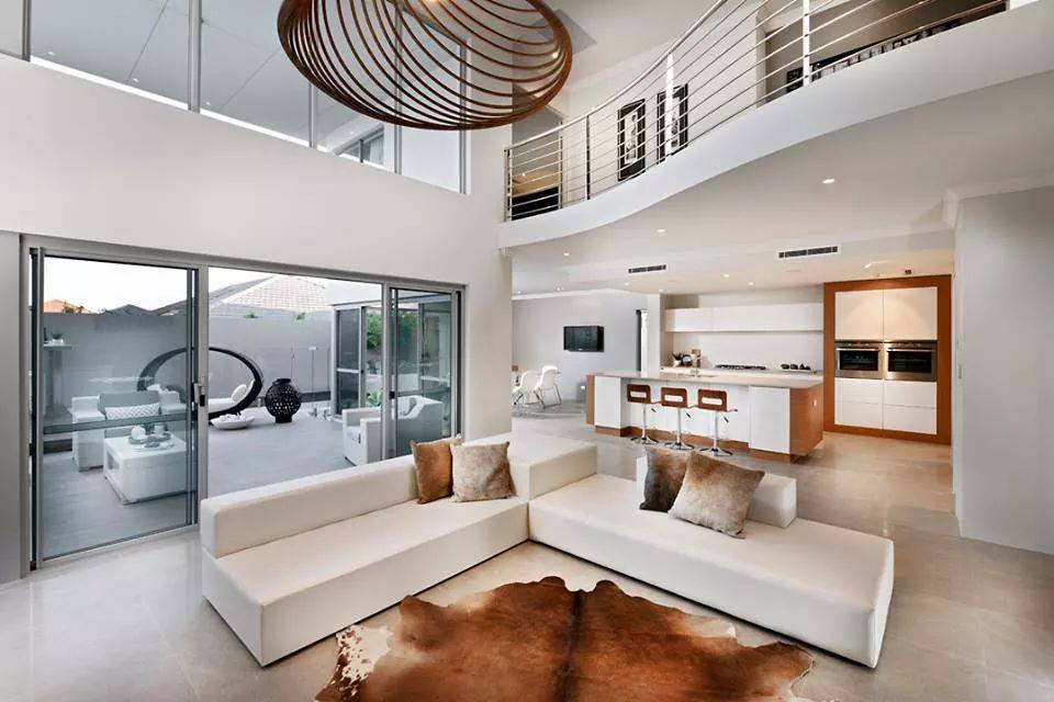 Living Room With White Sectional Sofa And Animal Printed Carpet by HOC Designarch Living-room Modern | Interior Design Photos & Ideas