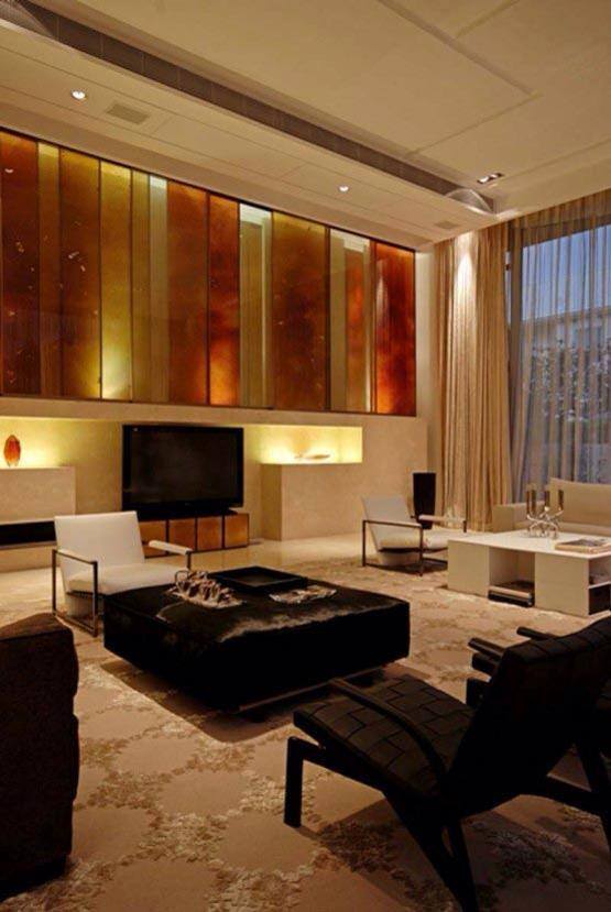 Living Room With Orange And Yellow Wooden Panel by HOC Designarch Living-room Contemporary | Interior Design Photos & Ideas