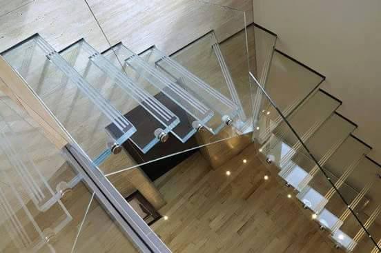 Spiral Glass Staircase by HOC Designarch Indoor-spaces Minimalistic | Interior Design Photos & Ideas