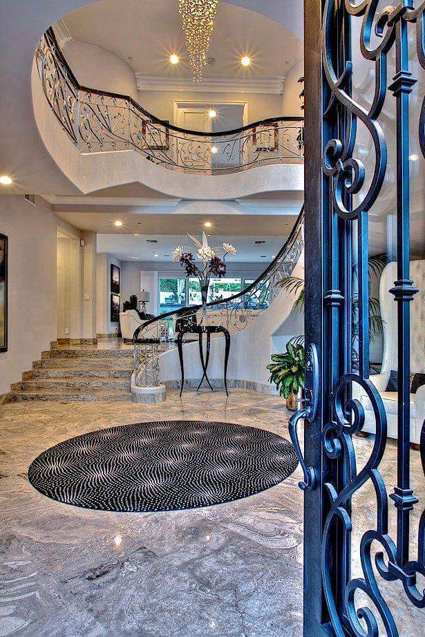 Royal Spiral Staircase With Golden Chandelier by HOC Designarch Indoor-spaces Contemporary | Interior Design Photos & Ideas