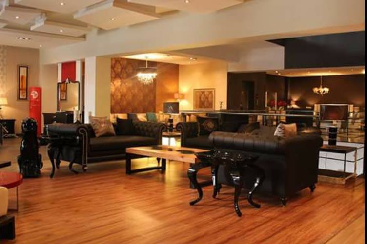 Traditional Styled Living Room With Black Sofas by HOC Designarch Living-room Traditional | Interior Design Photos & Ideas