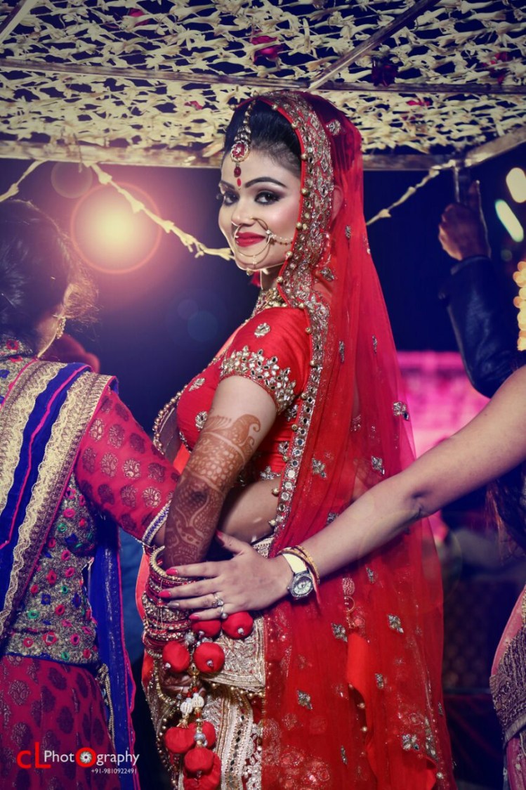 Crimson Bridal Gaze Under Phool Chadar by CL Photography Wedding-photography | Weddings Photos & Ideas