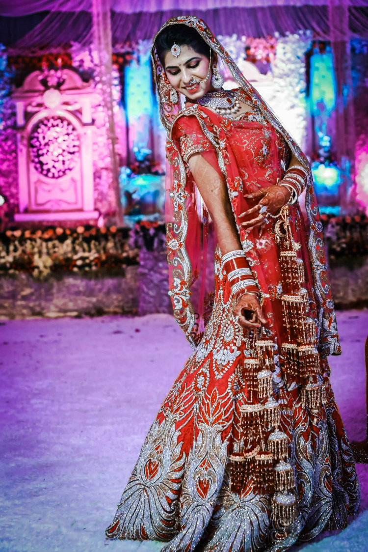 Bride In Red Heavily Embellished Lehenga by Gitesh Dhawan Wedding-photography Wedding-dresses | Weddings Photos & Ideas