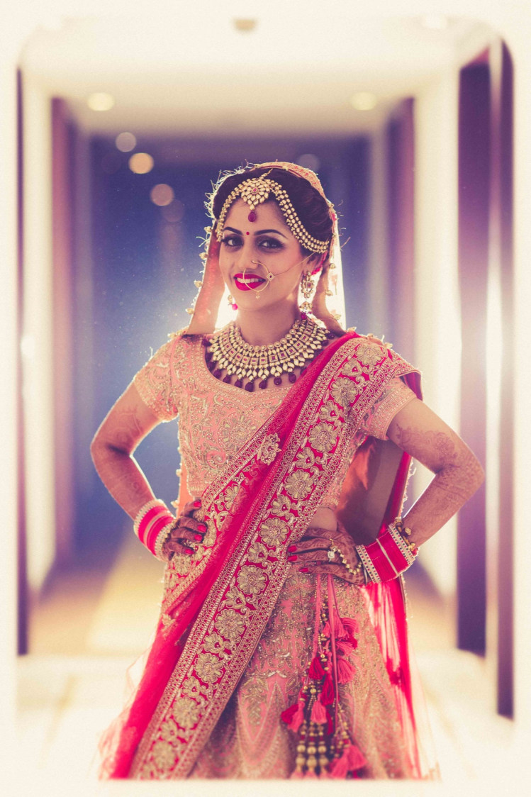 Bride Wearing Red And Peach Lehenga With Golden Embroidery by Gitesh Dhawan Wedding-photography | Weddings Photos & Ideas