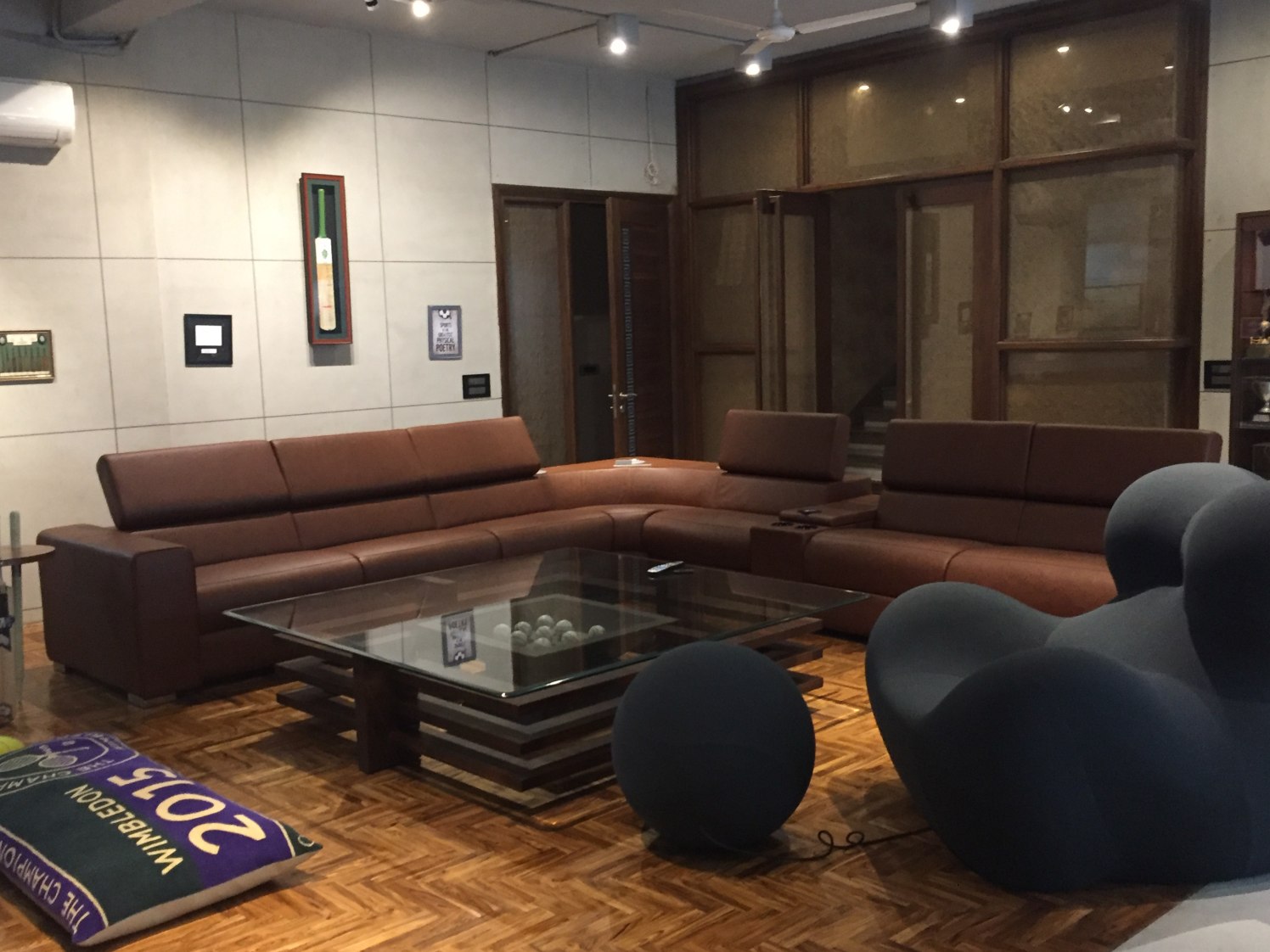 Living Room With Sectional Sofa And Wooden Flooring by Tarique Anwar Living-room Modern | Interior Design Photos & Ideas