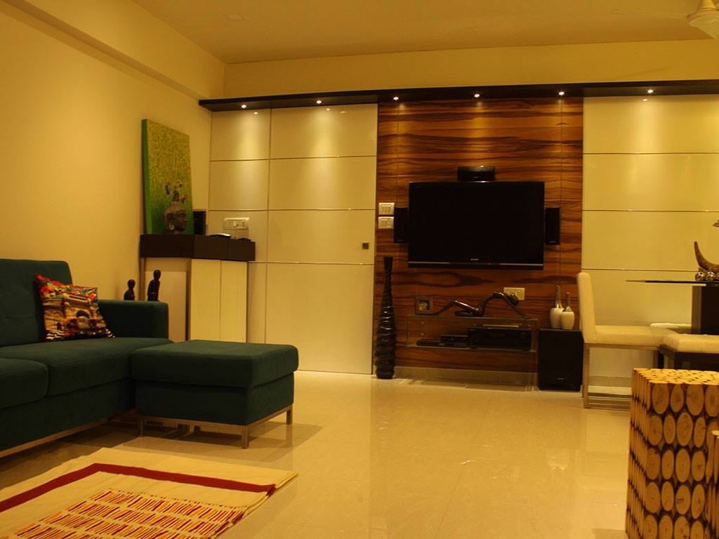 Living Room With Wooden TV Cabinet And Decor by Sridhar Mahankali Living-room Contemporary | Interior Design Photos & Ideas