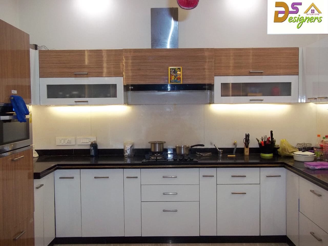 Kitchen With White Cabinets by Shivraj Singh Modular-kitchen Contemporary | Interior Design Photos & Ideas