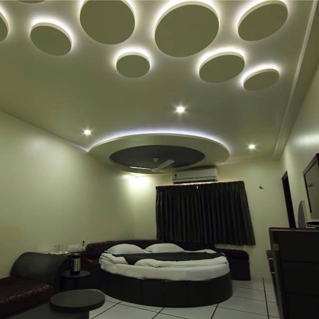 Circular Bed With Artistic False Ceiling by Icraft Desginz and interiors Bedroom Contemporary | Interior Design Photos & Ideas