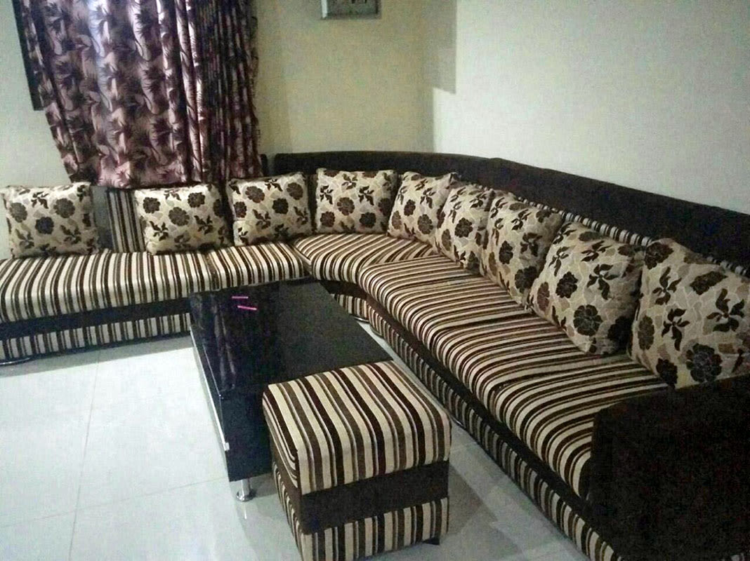 Living Room With Striped Sofa And Floral Print Cusions by Madhumathi. J. Dharwar Living-room Contemporary | Interior Design Photos & Ideas