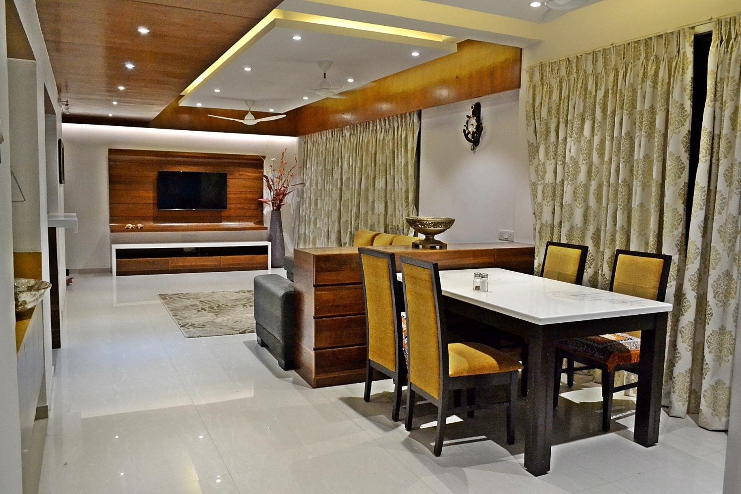 Dining Room With Pale Yellow Plush Chairs by Ankita Patel Dining-room Contemporary | Interior Design Photos & Ideas