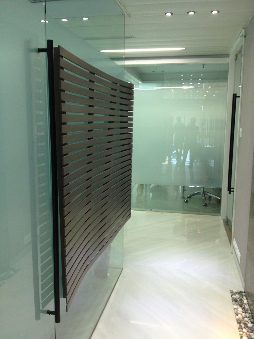 Entrance to a well lit office by Izan Architecture & Interiors Modern | Interior Design Photos & Ideas