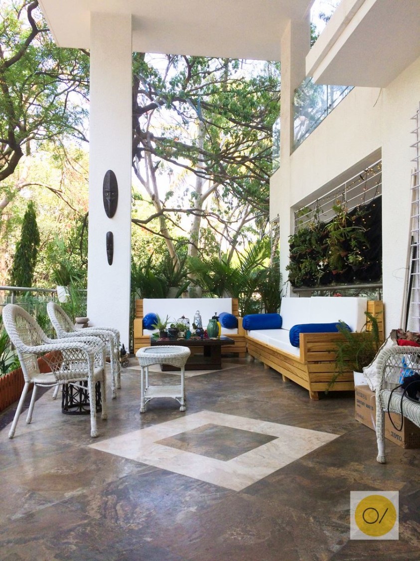 Artistic Open Space with Wooden Diwan And White Patio Furniture by Ogling Inches Design Architects Open-spaces Modern | Interior Design Photos & Ideas