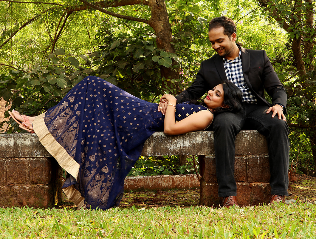 Bride and Groom To-Be Pose Against a Picturesque Garden Backdrop by Rushil Jadhav Wedding-photography Groom-wear-and-accessories Wedding-dresses | Weddings Photos & Ideas