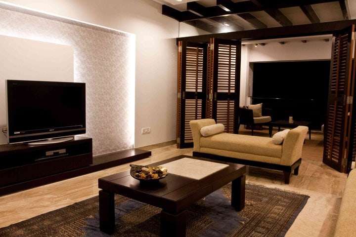 Beige Sofa With White Textured Wall by D'insignia