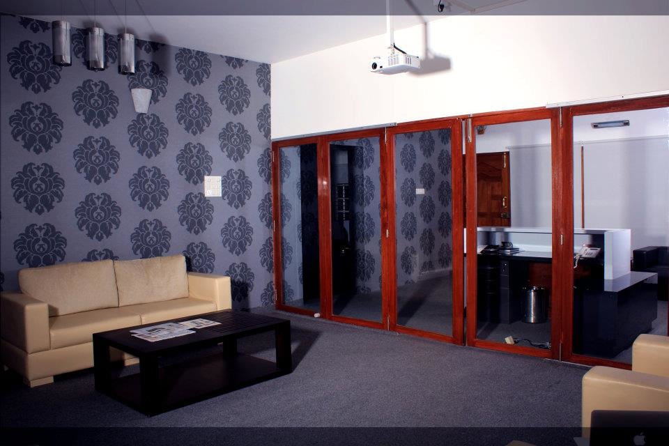 Waiting Area With Patterned Wall by D'insignia
