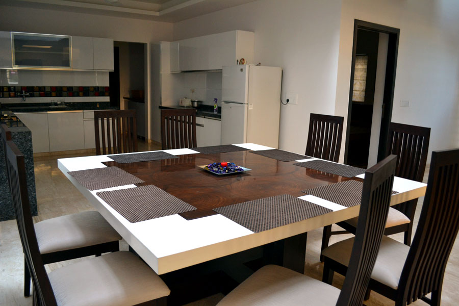 Well Kept Dining Room with Square Patterned Table and Wooden Chairs by Shristi Interiors Dining-room Modern | Interior Design Photos & Ideas