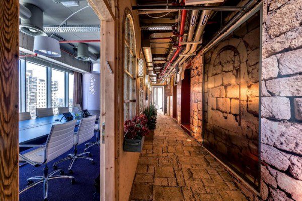 Office Hallway With Brick Textured Wall by Mohit Kumar Modern | Interior Design Photos & Ideas