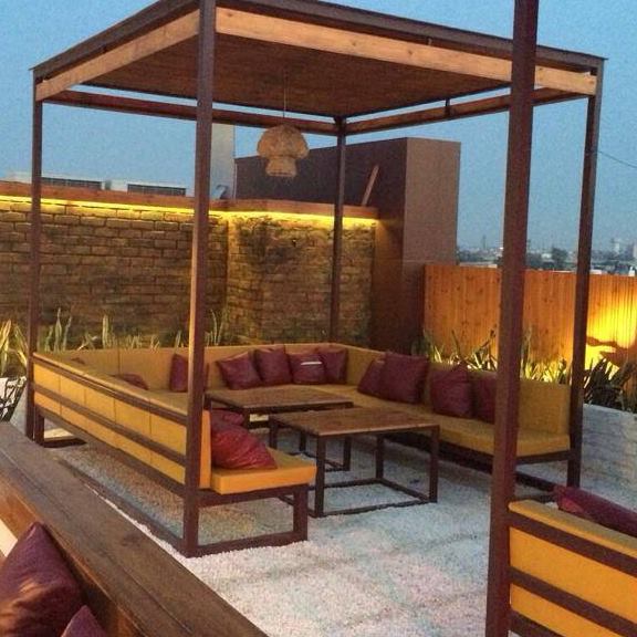 Open Restaurant With U-Shape Sofa by Mohit Kumar Contemporary | Interior Design Photos & Ideas